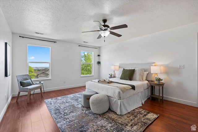 6286 W Anders Ridge Way S, West Valley City, UT 84128 - bedroom with wood finished floors, baseboards, a textured ceiling, and a ceiling fan