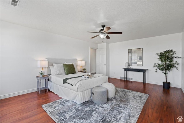 6286 W Anders Ridge Way S, West Valley City, UT 84128 - bedroom with wood finished floors, a textured ceiling, baseboards, and ceiling fan