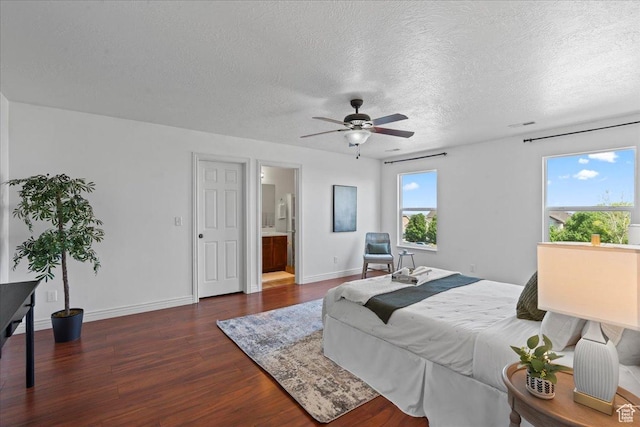 6286 W Anders Ridge Way S, West Valley City, UT 84128 - bedroom with dark wood-style floors, a textured ceiling, baseboards, and a ceiling fan