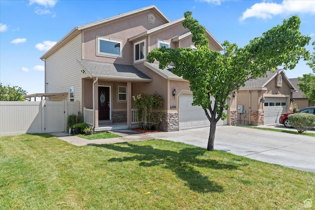 6286 W Anders Ridge Way S, West Valley City, UT 84128 - view of front facade featuring a gate, driveway, stone siding, stucco siding, and an attached garage