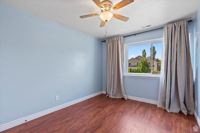 6286 W Anders Ridge Way S, West Valley City, UT 84128 - spare room featuring baseboards, wood finished floors, a textured ceiling, and ceiling fan