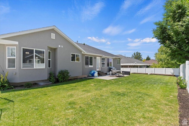 1628 W 1050 S, Syracuse, UT 84075 - back of house with entry steps, a patio area, and stucco siding