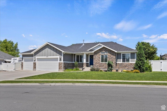 1628 W 1050 S, Syracuse, UT 84075 - craftsman-style home with a gate, stone siding, board and batten siding, a garage, and concrete driveway