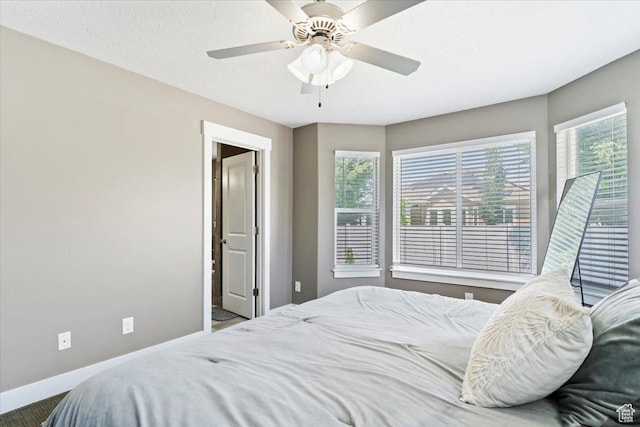1628 W 1050 S, Syracuse, UT 84075 - bedroom with carpet flooring, multiple windows, baseboards, and ceiling fan