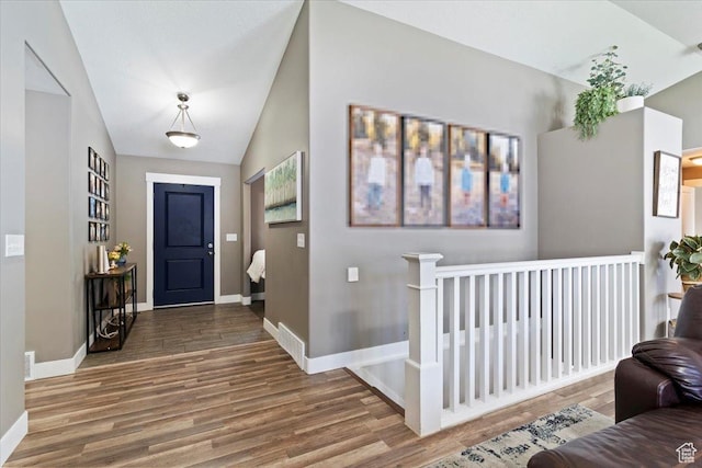 1628 W 1050 S, Syracuse, UT 84075 - foyer featuring wood finished floors, baseboards, and lofted ceiling