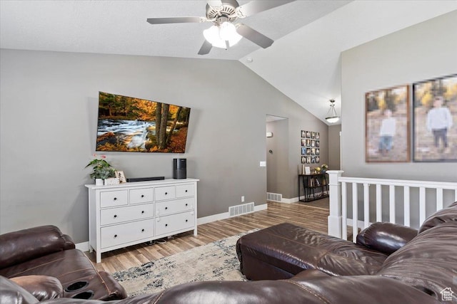 1628 W 1050 S, Syracuse, UT 84075 - living area featuring lofted ceiling, light wood-type flooring, ceiling fan, and baseboards