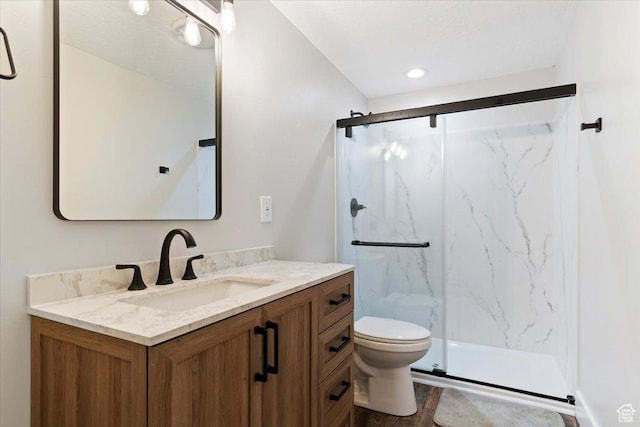 1628 W 1050 S, Syracuse, UT 84075 - bathroom featuring a marble finish shower, vanity, and toilet