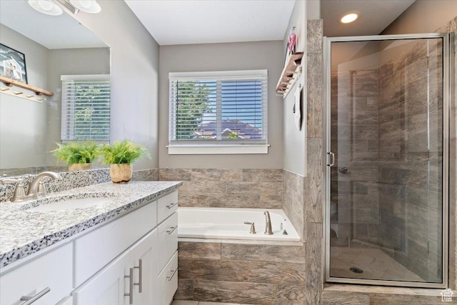 1628 W 1050 S, Syracuse, UT 84075 - full bathroom featuring vanity, a bath, and a shower stall