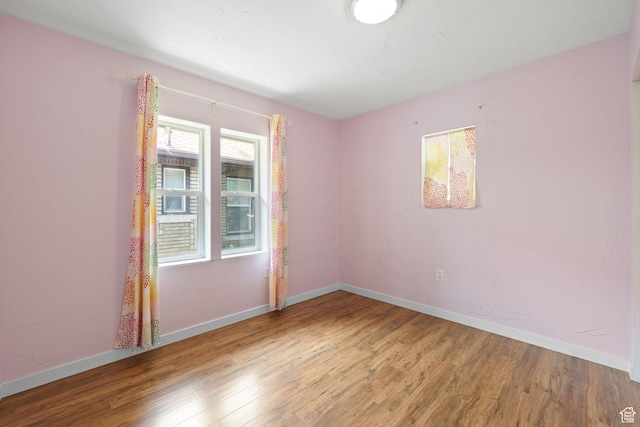 234 W 500 S, Provo, UT 84601 - empty room featuring wood finished floors and baseboards