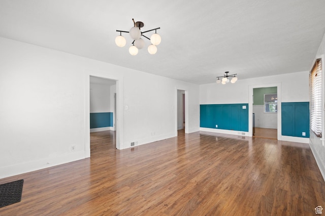 234 W 500 S, Provo, UT 84601 - unfurnished living room featuring a chandelier and wood finished floors