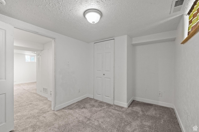 234 W 500 S, Provo, UT 84601 - unfurnished bedroom featuring carpet flooring, a textured ceiling, a closet, and baseboards