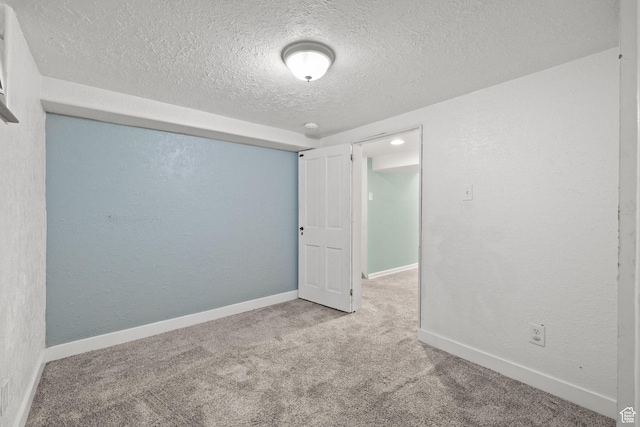 234 W 500 S, Provo, UT 84601 - empty room featuring a textured ceiling, carpet, a textured wall, and baseboards