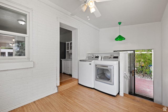 234 W 500 S, Provo, UT 84601 - washroom featuring separate washer and dryer, brick wall, a ceiling fan, and light wood-style flooring