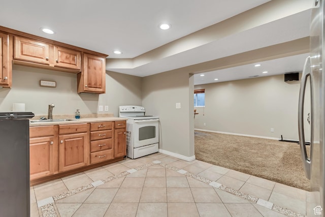 10453 S 2775th St W, South Jordan, UT 84095 - kitchen featuring white electric range oven, a sink, light colored carpet, recessed lighting, and light countertops