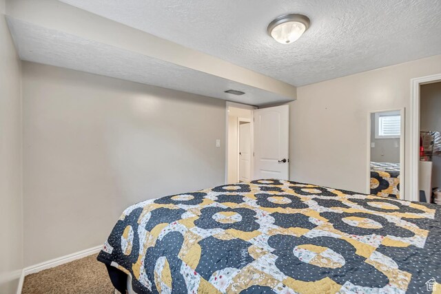 10453 S 2775th St W, South Jordan, UT 84095 - carpeted bedroom featuring a textured ceiling