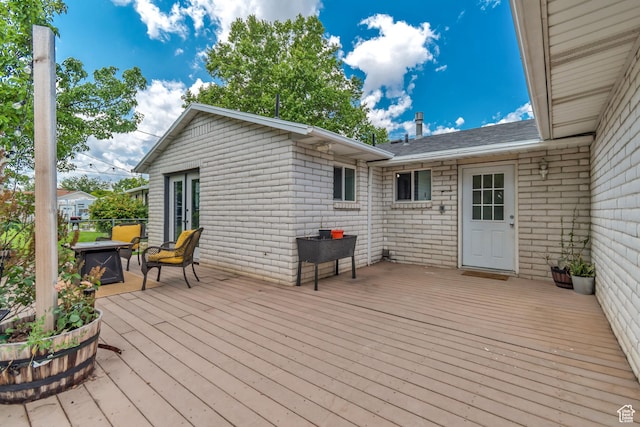 10453 S 2775th St W, South Jordan, UT 84095 - wooden deck with an outdoor fire pit