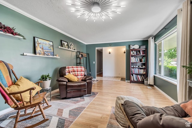 10453 S 2775th St W, South Jordan, UT 84095 - living area with crown molding, wood finished floors, and baseboards