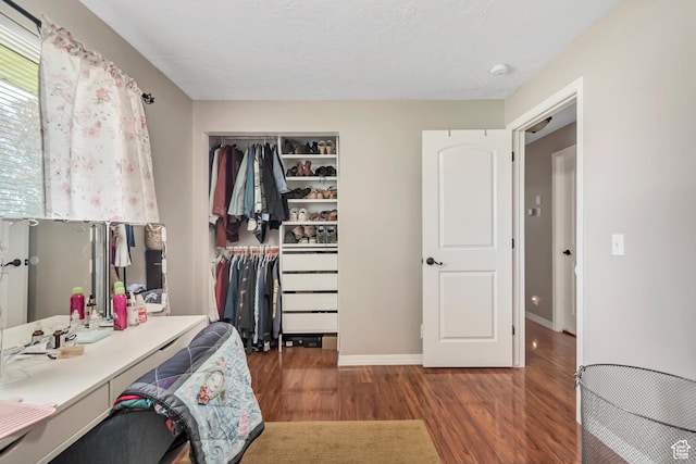 10453 S 2775th St W, South Jordan, UT 84095 - bedroom with wood finished floors, a closet, and baseboards