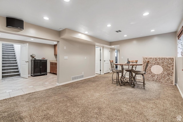 10453 S 2775th St W, South Jordan, UT 84095 - dining room featuring baseboards, recessed lighting, stairs, light colored carpet, and light tile patterned floors
