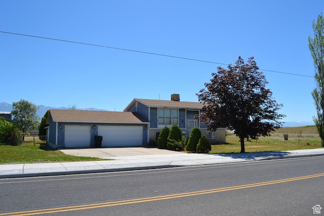 3037 S 2000 W, Syracuse, UT 84075 - view of front of property featuring an attached garage, concrete driveway, and stucco siding