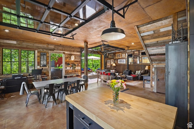 10754 Basin Canyon Rd, Park City, UT 84098 - dining area featuring finished concrete floors and wood walls