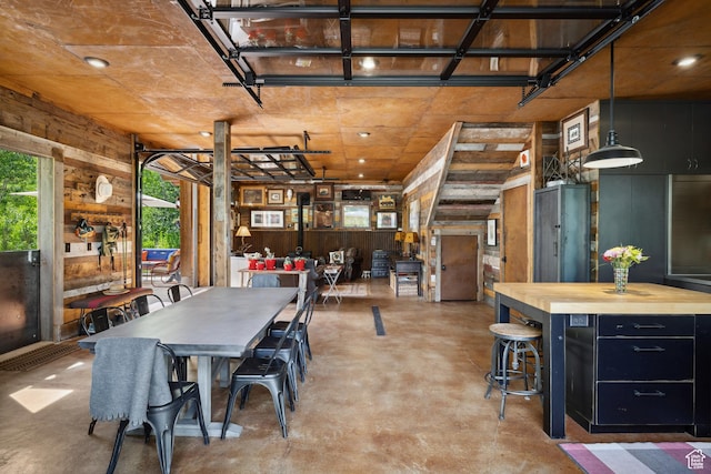 10754 Basin Canyon Rd, Park City, UT 84098 - dining area featuring concrete floors and wooden walls