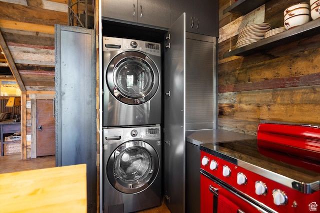 10754 Basin Canyon Rd, Park City, UT 84098 - laundry area featuring stacked washer / drying machine and wood walls