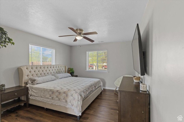 3093 S 1600 W, Nibley, UT 84321 - bedroom with dark wood-style floors, a textured ceiling, baseboards, and a ceiling fan