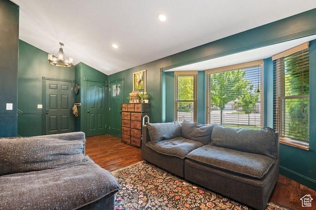 3186 W 5925 S, Roy, UT 84067 - living area featuring a chandelier, wood finished floors, recessed lighting, and vaulted ceiling