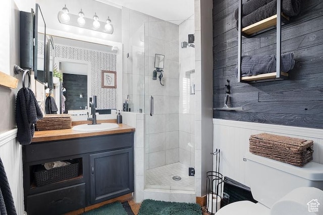 3186 W 5925 S, Roy, UT 84067 - bathroom with a shower stall, toilet, vanity, and wainscoting