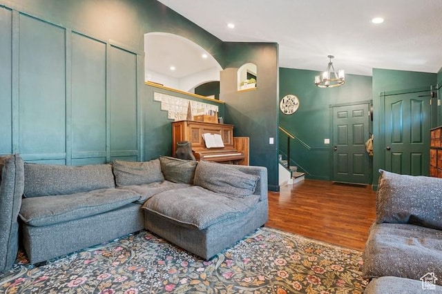 3186 W 5925 S, Roy, UT 84067 - living area with stairway, wood finished floors, a chandelier, baseboards, and recessed lighting