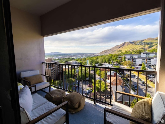 241 N Vine St Unit 1E, Salt Lake City, UT 84103 - balcony featuring a mountain view and an outdoor living space