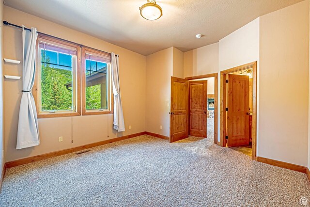 1273 W Lime Canyon Way, Midway, UT 84049 - unfurnished bedroom with carpet and baseboards