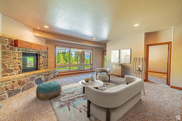 1273 W Lime Canyon Way, Midway, UT 84049 - carpeted living room with a textured ceiling, recessed lighting, baseboards, and a stone fireplace