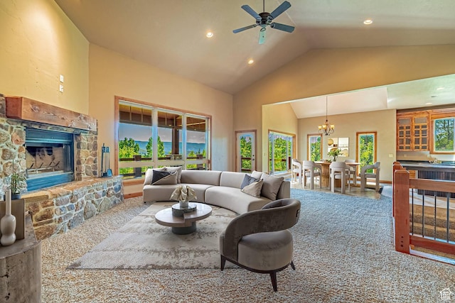 1273 W Lime Canyon Way, Midway, UT 84049 - carpeted living room featuring a stone fireplace, a chandelier, ceiling fan, high vaulted ceiling, and recessed lighting