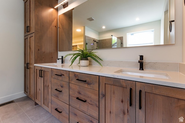 1792 N Siena Cir Unit 13, Pleasant Grove, UT 84062 - bathroom with double vanity, tile patterned floors, a tile shower, baseboards, and recessed lighting