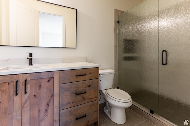 1792 N Siena Cir Unit 13, Pleasant Grove, UT 84062 - bathroom with vanity, toilet, a stall shower, and tile patterned floors