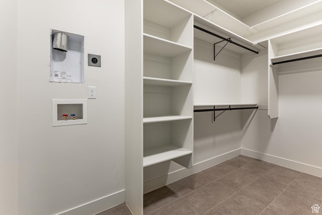 1792 N Siena Cir Unit 13, Pleasant Grove, UT 84062 - walk in closet featuring dark tile patterned floors