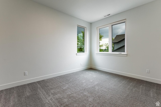 1792 N Siena Cir Unit 13, Pleasant Grove, UT 84062 - unfurnished room with baseboards and dark colored carpet
