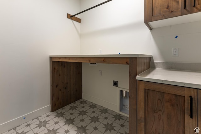 1792 N Siena Cir Unit 13, Pleasant Grove, UT 84062 - laundry room featuring electric dryer hookup, light floors, baseboards, and cabinet space