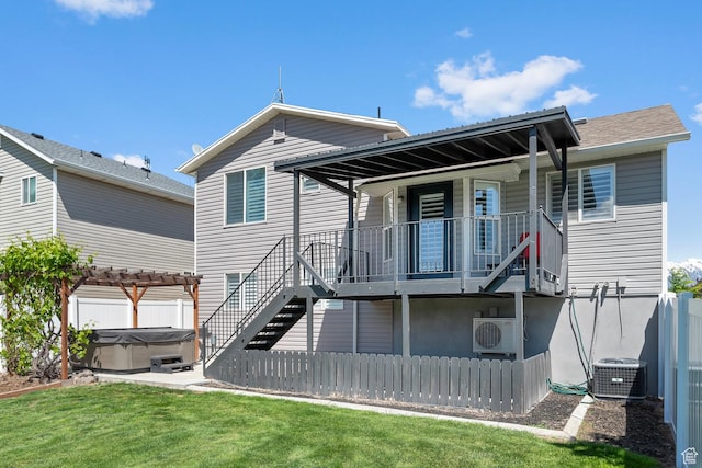 1677 N 2640 W, Lehi, UT 84043 - rear view of property featuring a hot tub, central AC, a cooling unit, and stairs