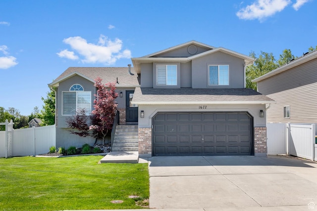 1677 N 2640 W, Lehi, UT 84043 - tri-level home with an attached garage, driveway, stucco siding, brick siding, and a shingled roof