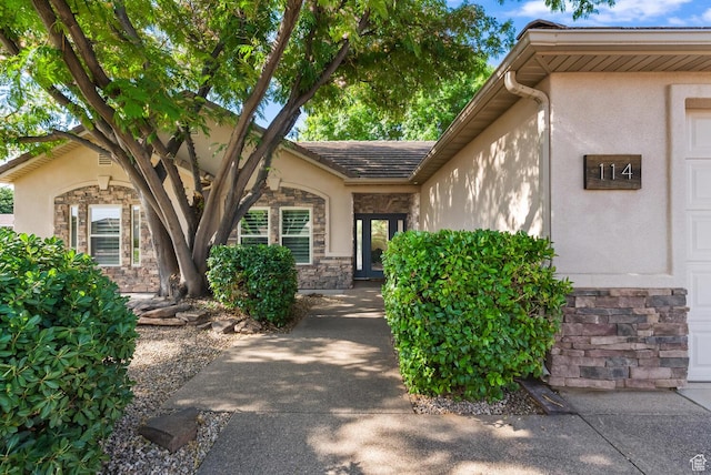 114 E Canterwood Dr, Washington, UT 84780 - entrance to property with stone siding, stucco siding, and a tile roof