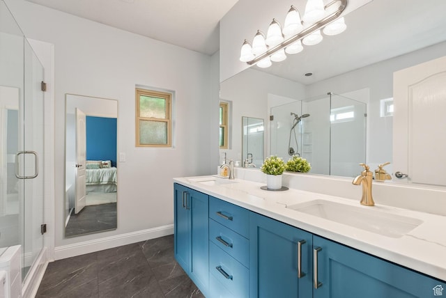 114 E Canterwood Dr, Washington, UT 84780 - bathroom with a stall shower, double vanity, marble finish floors, baseboards, and ensuite bathroom