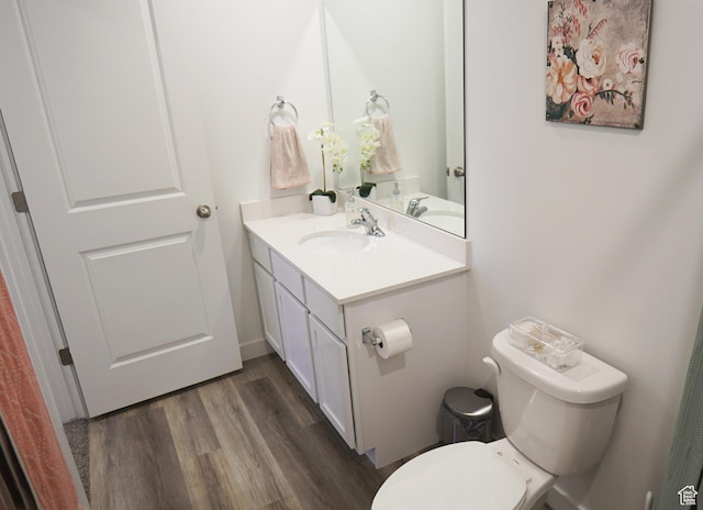 1291 S Harvest View Dr, Santaquin, UT 84655 - half bathroom with wood finished floors, vanity, and toilet