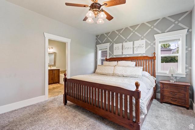 580 N Cherry Ridge Ln, Richmond, UT 84333 - bedroom featuring baseboards, carpet, ensuite bath, and ceiling fan