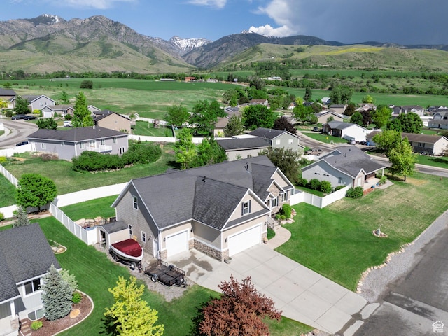 580 N Cherry Ridge Ln, Richmond, UT 84333 - aerial view of residential area featuring a mountain backdrop