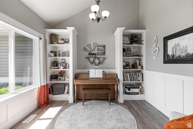 580 N Cherry Ridge Ln, Richmond, UT 84333 - sitting room featuring wood finished floors, vaulted ceiling, and wainscoting