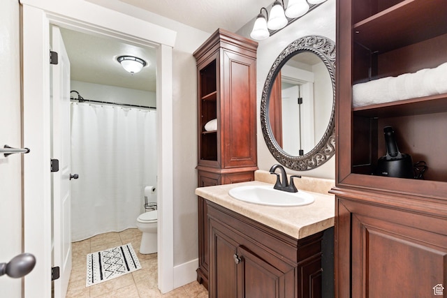580 N Cherry Ridge Ln, Richmond, UT 84333 - bathroom featuring vanity, toilet, tile patterned floors, and a shower with shower curtain