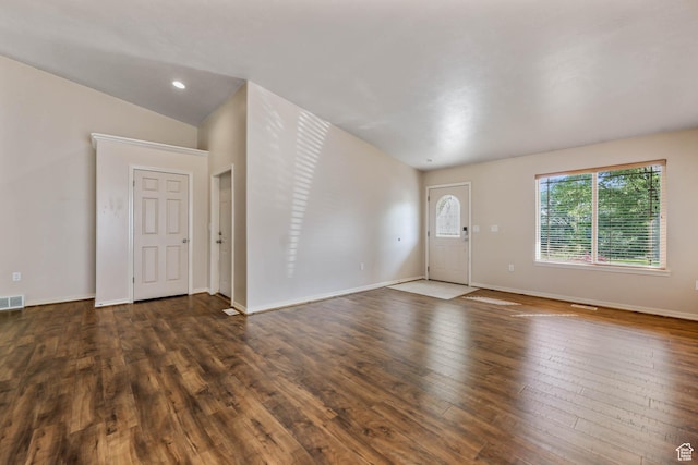 18 Clubhouse Dr, Stansbury Park, UT 84074 - unfurnished living room with hardwood / wood-style floors and baseboards